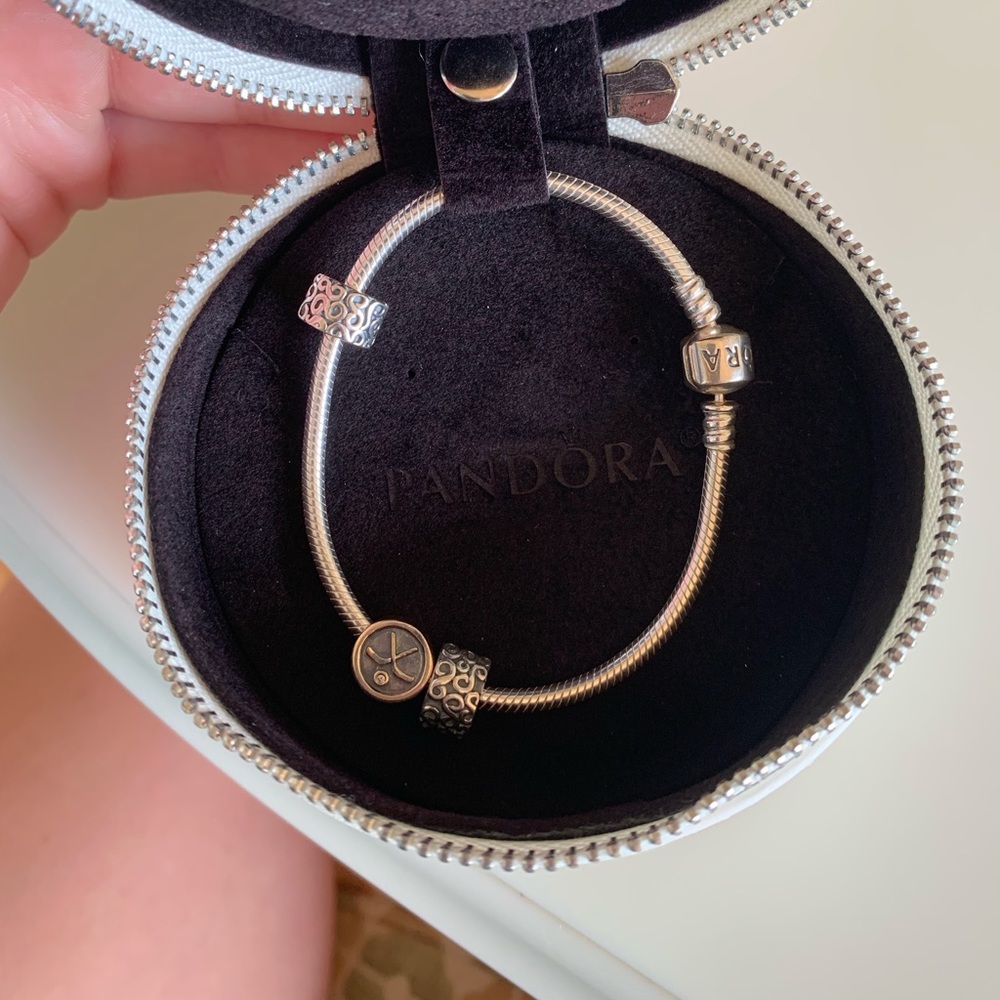 BRAND NEW! Pandora bracelet with hockey charm